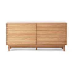 the sideboard is made from wood and has three drawers, one with two doors