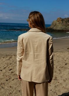 Double breasted corduroy blazer with pockets. A classic blazer in the perfect beige for fall. We love the texture of this jacket and how it looks paired with a simple black slip dress and boots for a casual-chic fit. Relaxed fit Double breasted Shoulder pads Self: cotton, spandex Lining: poly Elegant Corduroy Outerwear For Work, Fall Corduroy Outerwear With Notch Lapel, Notch Lapel Corduroy Outerwear For Fall, Elegant Corduroy Blazer For Work, Corduroy Notch Lapel Outerwear For Fall, Corduroy Sport Coat With Notch Lapel For Workwear, Spring Corduroy Blazer With Pockets, Fall Corduroy Single Breasted Blazer, Fall Corduroy Single-breasted Blazer