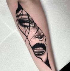 a woman's face with an abstract design on her arm