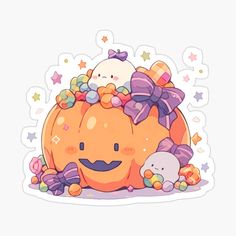 an orange pumpkin with bows and other decorations on it's head, sitting in the middle