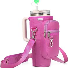 a pink water bottle with a strap around it and a cup holder attached to the side