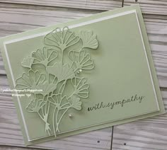 a close up of a card with flowers on it