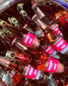 a bucket filled with lots of different types of bottles