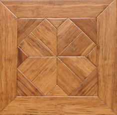 a close up view of a wooden door with four squares in the center and one square at the bottom