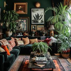 a living room filled with lots of furniture and plants