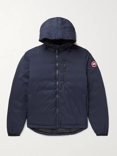 Canada Goose's 'Lodge' jacket is lightweight and packs into one pocket, making it a great option for ski trips and long commutes. It's made from the label's signature Basecamp-20D nylon-ripstop that's both windproof and highly durable, and padded with 750 fill power down for warmth. Wear it with: OrSlow Jeans, Aloye T-Shirt, Converse Sneakers. Canada Goose Chilliwack Men, Montebello Parka Canada Goose, Blue Canada Goose Jacket, Canada Goose Junction Parka, Canada Goose Black Label, Blue Parka, Blue Jacket Men, Canada Goose Mens, Color Block Jacket