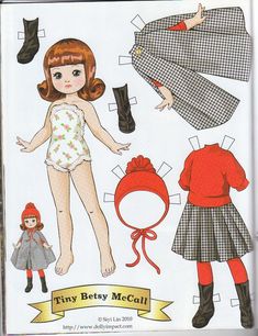 the paper doll is made to look like she's having fun with her clothes