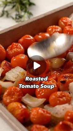 tomatoes and onions being cooked in a pan with a ladle that reads roasted tomato soup