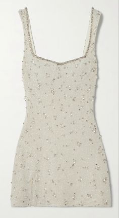 a white dress with sequins on it