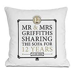 a white pillow with the words mr and mrs griffths sharing the sofa for twelve years