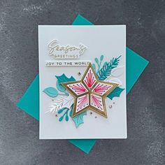 a christmas card with a star on it