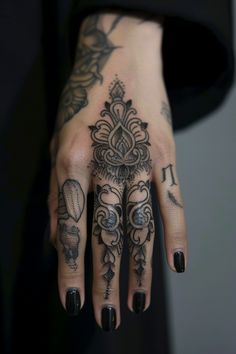 Hand with intricate black ink tattoos and black nail polish on the fingernails. Elegant Finger Tattoos, Delicate Finger Tattoos For Women, A Finger Tattoo, Finger Tattoos For Women, Impossible Shapes, Hard Tattoos, Meaningful Symbols