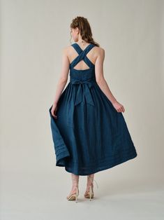 "Summer calls for a crisp dress and this cross-back dress from Linennaive is pretty perfect.  Made from breezy linen, it has comfortable cross back that'll really let skin breathe. Featuring a a classic square neckline and pleated detailing, evoking the laidback rhythms of far-off islands and unexplored landscapes.  It enhance the grace and femininity with a whimsical and flattering flow.  PS: It show very gorgeous and rich colors in sunlight for a truly one-of-a-kind, sophisticated allure. 【Fabric】 100% Linen, around 200g/gram. Medium weight. Every year we have a dedicated team to study the evolution of linen. Linen is a traditional fabric. It seems that linen will not change even if dynasties have changed, and time has passed. Let us add a little imagination and curiosity here. If the ra Midi Dress Cocktail, Unique Maxi Dresses, Dress Apron, Linen Layers, Dress Layered, Linen Fashion, Dyed Linen, Apron Dress, Midi Cocktail Dress