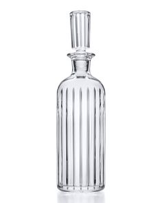 a clear glass bottle on a white background