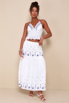 With your favorite sandals and the Lulus Summery Aura White Embroidered Tiered High-Waisted Maxi Skirt, your warm weather looks will always be adorable! Lightweight woven fabric shapes this breezy skirt that has a high, elasticized waist and a tiered design, with blue floral embroidered details throughout. Maxi hem completes the look. Pair with the matching top for a complete look! Fit: This garment fits true to size. Length: Ankle length. Size medium measures 36.5" from waist to hem. Waist: Fit Tropical Maxi Skirt, White Skirt Summer, Cute Maxi Skirts, Aura White, Spain Outfit, Greece Fashion, High Waisted Maxi Skirt, Maxi Skirt Outfits, Tiered Maxi Skirt