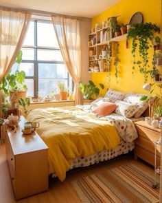 a bed room with a neatly made bed and lots of plants