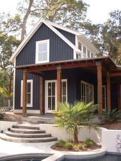 an image of a small house with steps leading up to it