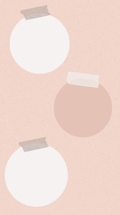 two round objects on a pink background