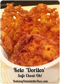 some fried food in a white bowl on a table