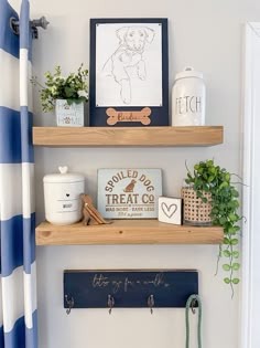 two wooden shelves with pictures and other items on them