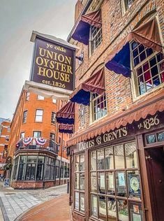 the union oyster house is located in an old brick building with awnings over it's windows