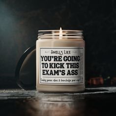 "Looking for the perfect gift to wish someone good luck on their final exam? Look no further! Our unique and thoughtful good luck on your final exam candle is here to help boost their spirits and confidence. Whether they're studying late nights or cramming for that last-minute review, this gift is designed to show your support and encouragement.  Give them the gift of good luck and show them that you believe in their success. Candle Facts: Burning time: 50-60 hours | Free of Dyes & Parabens | Vegan | Organic | Assembled in the USA  Original Design by Box Your Occasion (all rights reserved)  Thank you so much for supporting my small business! This shop was created when after nearly 10 years of being a stay at home Mom, I found myself lost and intimidated by reentering the \"work force\". Th Exam Study Gift Basket, Final Exam Gift Basket, Bar Exam Care Package, Gifts For Passing The Bar Exam, Good Luck On Your Exam, Candle Facts, Bar Exam Gift, Studying For Finals, Gift For College Student