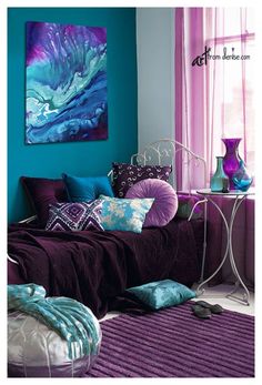 a bedroom with purple and blue colors in it