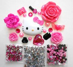 hello kitty nail art with pink roses and sequins