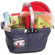 a picnic basket filled with food and snacks