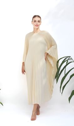 "A special collection with pleated kaftan in fan-style will bring the best \"new\" look for any occasions you may attend. Classic but chic !. It's totally smoothly flowy, soft and gentle touch. FEATURES - Lilac, Light Purple  - Pleated - Personal Custom Made - Full Length Kaftan  - Designer Silk Kaftan - Plus Size and Custom Length - Resort Wear, Beach Wear, Lounge Wear, Pool Cover Up Kaftan - Boat Neck -------------------------------- DETAIL  * The maximum length : 134 CM ( please be noted, this can not cut shorter or extended longer due to the fabric's nature) * The width : Around 130-134 CM (flat measurement) or full circumference 260-264 CM *  The width ( between the sewing line to sewing line) : around 70-72 CM ( flat measurement) or full circumference 140-144CM  *This fit well up to Elegant Flowy Spring Abaya, Chic White Flowy Kaftan, Elegant Flowy Abaya For Eid, Elegant Abaya With Cape Sleeves, Elegant Summer Maxi-length Thobe, Elegant Summer Maxi Thobe, Elegant Maxi Length Summer Thobe, White Maxi-length Kaftan For Evening, Elegant Summer Abaya