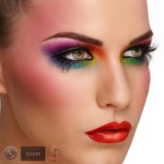 This powerful makeup features a beautiful combination of colorful eyeshadow tones. It is further matched with bright red lipstick and a powerfully bright blush. DIY with the how-to here. Eye Makeup Red, Orange Eye Makeup, Beauty Portraits, Bright Eye Makeup, Red Lipstick Makeup, Bright Red Lipstick, Bright Makeup