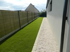 the grass is green and ready to be used as an artificial turf area for landscaping