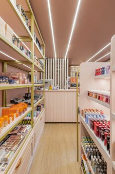 a store with shelves filled with lots of different types of items and colors on them