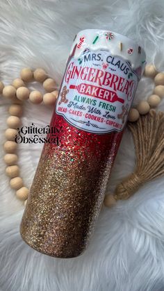 a close up of a bottle of candy on a white furnishing with beads