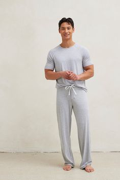 Introducing your stay at home uniform. Lounge in comfort all day in this incredibly soft and breathable pajama set. This set includes straight leg pajama pants and a matching raglan cut t-shirt. Made from our signature ultra-soft and moisture-wicking fabric blend. Made in Canada. 93% Viscose from Bamboo / 7% Spandex. Fits true to size. Available in S, M, L, XL. S (28-30), M (32-34), L (36-38), XL (40-42). Machine washable and dryer friendly. Lounge Wear Men, Night Fits, Mens Pajama, Soft Pajama Pants, Mens Pajama Pants, White Pajamas, Summer 2025, Mens Pajamas Set, Mens Sleepwear