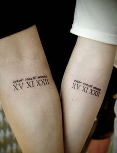 two tattoos with roman numerals on their arms and the words, 26 el amo tod lo vence