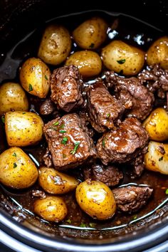 beef and potatoes in the slow cooker are ready to be cooked for lunch or dinner