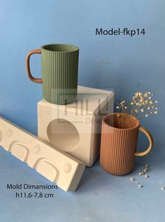 the model kp114 is made out of plastic and has two mugs on it