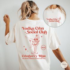 Embrace our Vodka Cranberry shirt! This tee is perfect for anyone who loves cocktails or appreciates aesthetic shirts! Treat yourself or surprise a friend with this thoughtful gift!  👕 COMFORT COLORS 1717 T-SHIRT The Comfort Colors 1717 garment-dyed unisex t-shirt is made with medium fabric consisting of high quality, 100% ring-spun US cotton for long-lasting comfort. All shirts feature pre-shrunk cotton for size retention and a signature sewn-in twill label. 👕 SIZING & CARE Shirt runs true to size. If you prefer an oversized fit, we recommend sizing up. For the desired oversized look, we personally suggest sizing up 2-3 sizes. We recommend washing inside out in cold water with like colors. Tumble dry on low or air dry for the best results.  🖨️ PRINTING PROCESS Direct-to-garment printin Alcohol Tshirt Design, Alcohol Shirts, Vodka Shirts For Women, Vodka Branding, May Contain Alcohol Shirt, Vodka Cran, Cocktail Tshirt, Cranberry Vodka, Bachelorette Tshirts