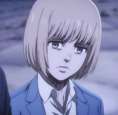 an anime character with blonde hair wearing a blue suit and tie, staring at the camera