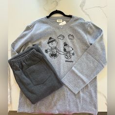 New Men’s Size, Large, Snoopy Sweatshirt, And Sweatpants. Snoopy Sweatshirt, Snoopy Sweater, Purple Crewneck, Candle Pedestal, Grey Sweats, Blue Crewneck, Holiday Sweatshirt, Grey Sweatpants, Peanuts Snoopy