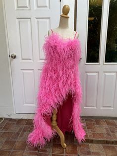 "Felicia Shocking Pink Ostrich feather Long Tail Dress 🌸Made to order 🌸Please check my sizes chart before ordering(US, UK, EU,AU) 🌸if it doesn't fit with my size chart please measure your bust waist and hips for me 🌸zipper closure on the back side 🌸Dress Embroidered with ostrich feathers beads and sequins 🌸More than 20 colors 🌸Dry clean only SGinstar Size Guide UK4/US0/EU32/AU4 Bust 31\"(78cm.) Waist24\"(60cm.) Hips33\"(83.5cm.) UK6/US2/EU34/AU6 Bust32\"(80.5cm.) Waist25\"(63cm.) Hips34\" Glamorous Wedding Dress With Ostrich Feathers, Glamorous Ostrich Feather Wedding Dress, Fitted Pink Feather Dresses, Feathered Party Gown, Pink Pageant Dresses With Sweep Train, Sleeveless Feathered Wedding Dress, Pink Feather Trim Wedding Dress, Sleeveless Feather Wedding Dress, Sleeveless Wedding Dress With Feathers