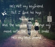 two people walking down a dirt road holding hands with the words, he's not my boyfriend but i love his hugs