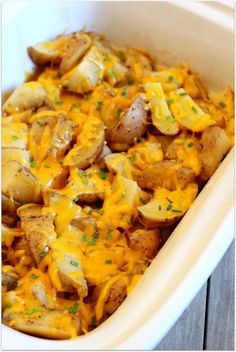 a casserole dish with potatoes and cheese