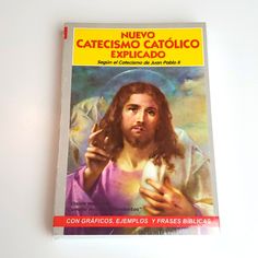 a book with an image of jesus holding a cat in his hand and the title