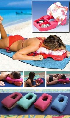 a woman laying on top of a beach towel next to an inflatable device