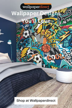 a bed room with a large wallpaper design on the wall and a basketball ball painted on the wall