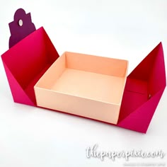 an open pink and red box on a white background