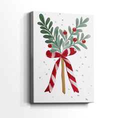 a christmas card with holly and candy canes