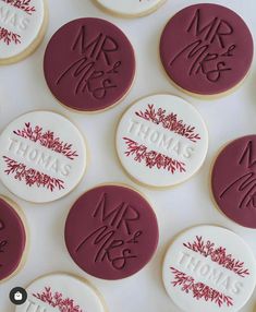 decorated cookies with the words mr and mrs in red on them are arranged next to each other